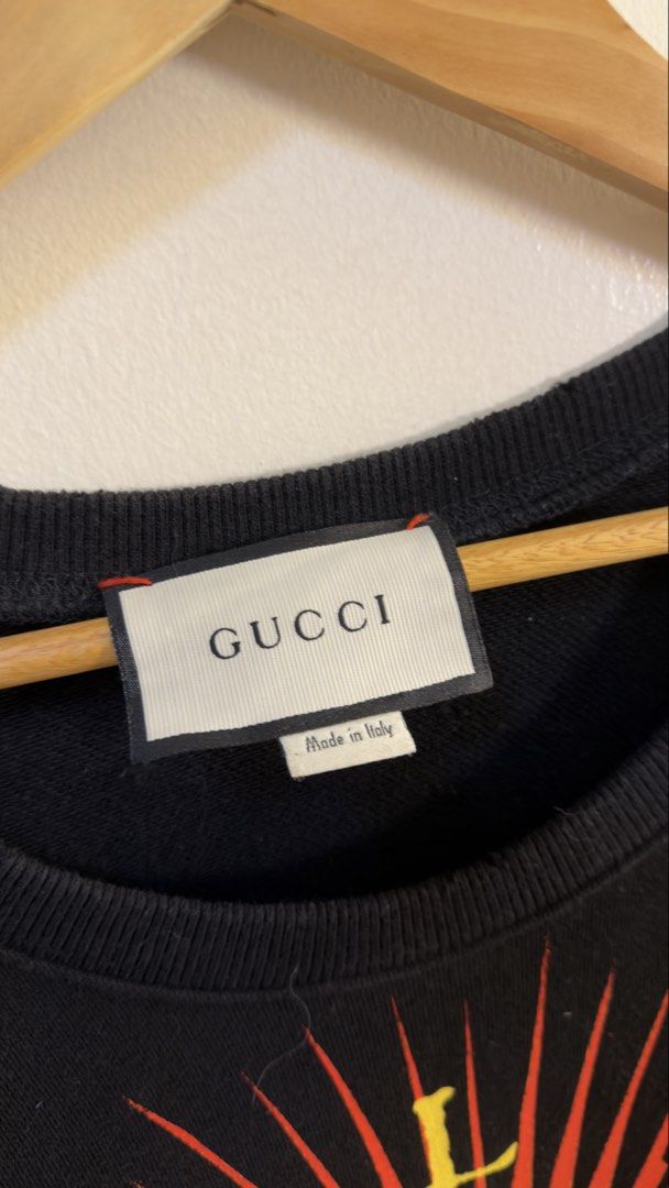 Gucci Black Tiger Print Sweatshirt (Category: Coats, Jackets and Outerwear) located in Paranaque City. Submitted by preluxeshop_ph (Listing ID 1466769216, Image 3). Description: Gucci Black Tiger Print Sweatshirt -Features a bold front tiger graphic -‘MODERN’ and ‘FUTURE’ text on the back -Condition: 9.8/10 -Dimes: Length: 24” Width: 22”.