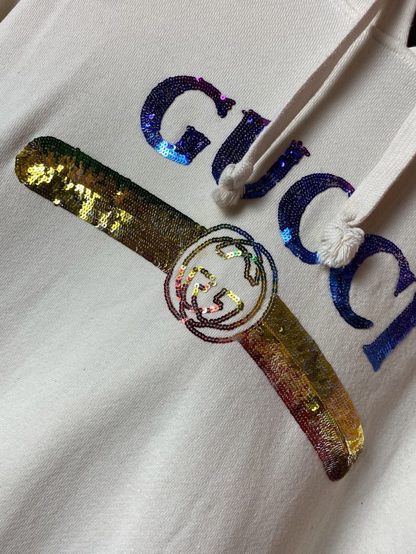 Gucci Hooded Jacket with Sequin Gucci Logo (Category: Coats, Jackets and Outerwear) located in Quezon City. Submitted by loloyz123 (Listing ID 1466712698, Image 2). Description: Gucci Hooded Jacket with Sequin Gucci Logo Condition: Very good Color rate: 9.8/10 Color: Beige Size: Small L: 26 W:22 inches.