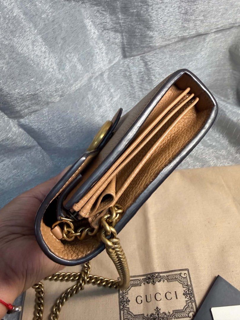 Gucci Marmont wallet on chain (Category: Luxury Bags & Wallets) located in Las Pinas. Submitted by beatrice_z (Listing ID 1466592578, Image 3). Description: - Authentic Gucci Wallet on Chain in beige/tan leatjer - Features iconic antique gold double G hardware on flap closure - Versatile design with a removable chain strap for shoulder or clutch wear - Organized interior with multiple card slots, slip compartments, and a secure zippered pocket - 