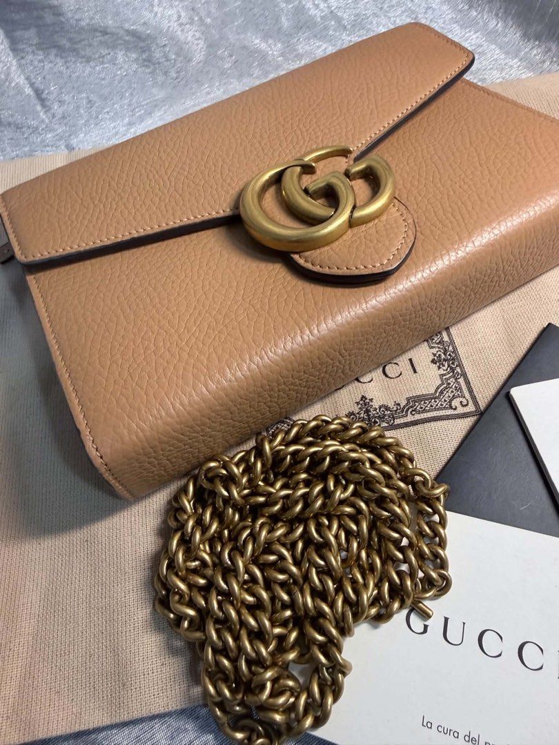 Gucci Marmont wallet on chain (Category: Luxury Bags & Wallets) located in Las Pinas. Submitted by beatrice_z (Listing ID 1466592578, Image 2). Description: - Authentic Gucci Wallet on Chain in beige/tan leatjer - Features iconic antique gold double G hardware on flap closure - Versatile design with a removable chain strap for shoulder or clutch wear - Organized interior with multiple card slots, slip compartments, and a secure zippered pocket - 
