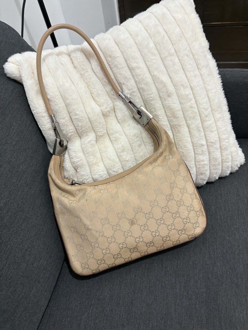 Gucci Monogram Beige Canvas Shoulder Bag (Category: Luxury Bags & Wallets) located in Manila. Submitted by maglips (Listing ID 1466619839, Image 1). Description: in good condition no major flaw Money back guaranteed if proven fake.