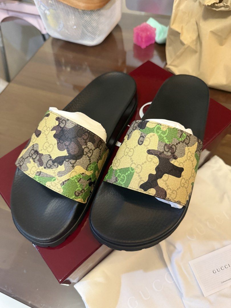 Gucci Slides for Men Size 10 (Category: Slippers & Slides) located in Paranaque City. Submitted by mimibernardo (Listing ID 1466690356, Image 2). Description: Gucci Pursuit Trek Slides Size 10 / 29cm Green and Tan Camouflage GG Canvas Made in Italy Brand new / Unworn Original Gucci box, dust bags, and authentication card RFS: wrong size .