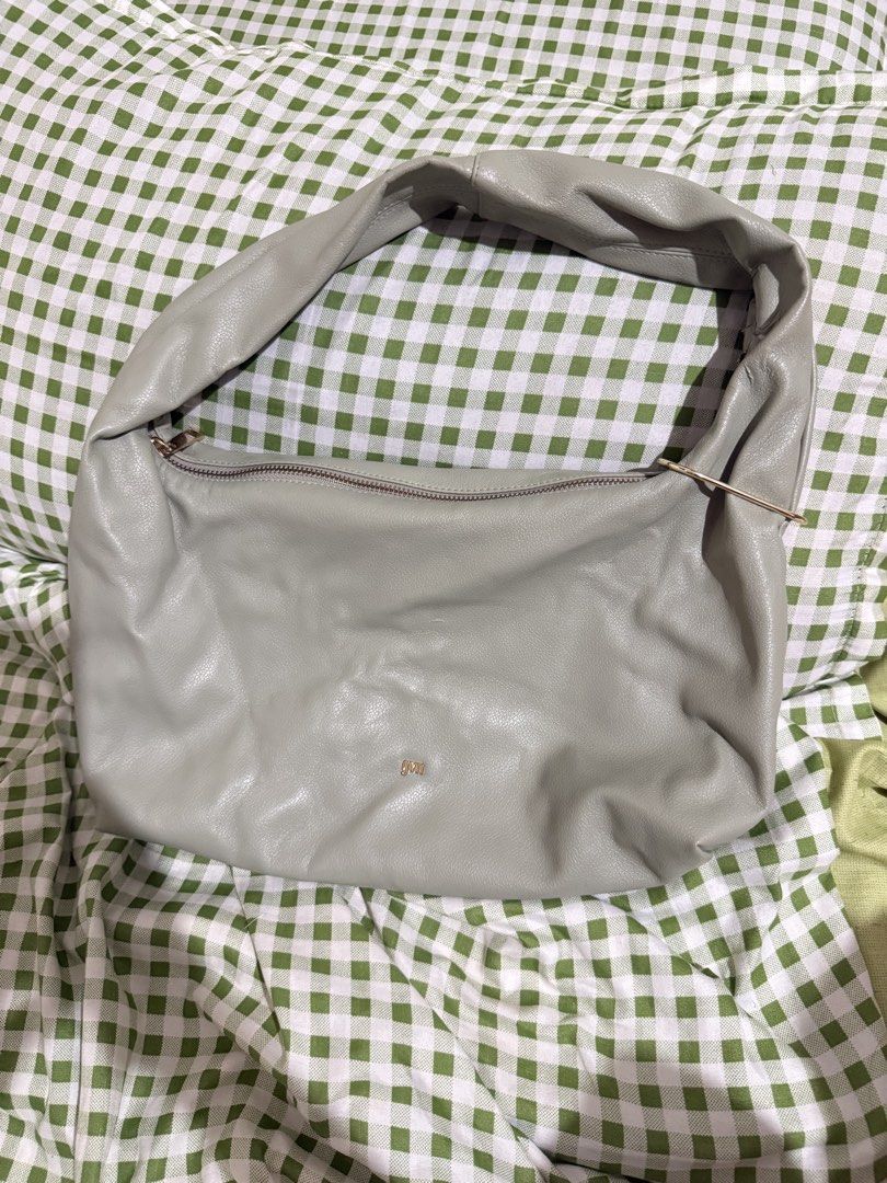 GVN Hobo Bag (Category: Shoulder Bags) located in Paranaque City. Submitted by ginggersnapx (Listing ID 1466680673, Image 1). Description: Well used GVN hobo bag Color Sage Medium hobo bag Meet up (Naga Camarines Sur) or Delivery J&T/LBC.