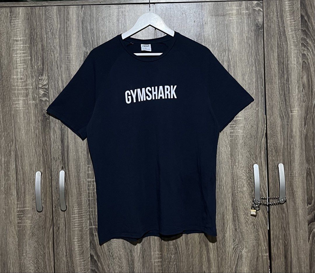 🦈GYMSHARK SCRIPT SHIRT (Category: Tshirts & Polo Shirts ) located in Dumaguete. Submitted by marc_umbac89 (Listing ID 1466729786, Image 1). Description: 🦈GYMSHARK SCRIPT SHIRT ₱600 ~Excellent And Brand New Condition ~No Issue Or Flaws ~Complete Tags ~Navy Blue Colorway ~Size:Best Fit Size Large ~Length:28 Width:21 📌Dumaguete City Negros Oriental ✅Unli Vouch And VC For Legitimacy ‼️DISCLAIMER: I Am Not Affiliated With The Official Brand Display
