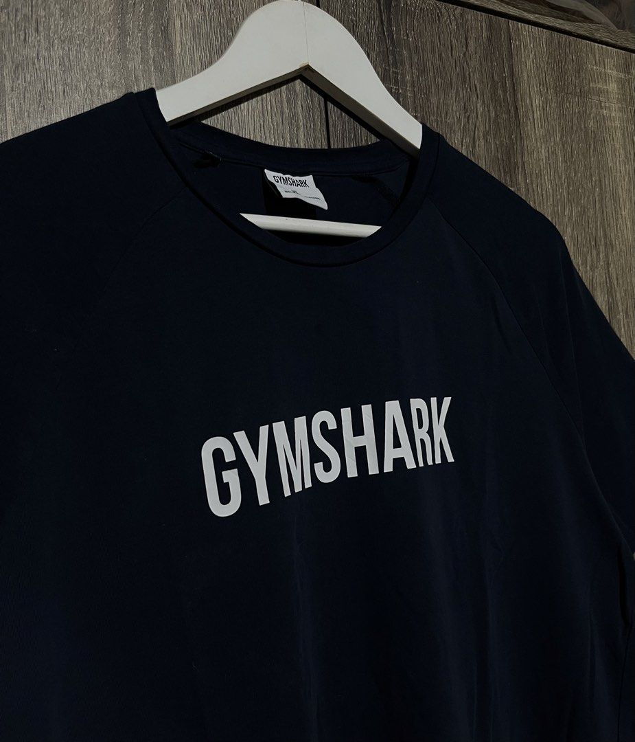 🦈GYMSHARK SCRIPT SHIRT (Category: Tshirts & Polo Shirts ) located in Dumaguete. Submitted by marc_umbac89 (Listing ID 1466729786, Image 2). Description: 🦈GYMSHARK SCRIPT SHIRT ₱600 ~Excellent And Brand New Condition ~No Issue Or Flaws ~Complete Tags ~Navy Blue Colorway ~Size:Best Fit Size Large ~Length:28 Width:21 📌Dumaguete City Negros Oriental ✅Unli Vouch And VC For Legitimacy ‼️DISCLAIMER: I Am Not Affiliated With The Official Brand Display