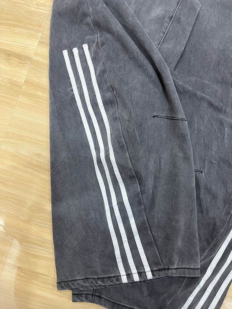 Acid Wash Denim Pants with Side Stripes (Category: Jeans) located in Angeles City. Submitted by thriftsij (Listing ID 1466743664, Image 3). Description: -Dark grey acid wash denim pants. -Size M (Freesize) -40 l 17 Thigh 11 lo -Relaxed baggy fit Three white side stripes running down both legs. -Durable denim fabric with a worn-in vintage look. -Great streetwear piece, easy to style with oversized tees or hoodies..
