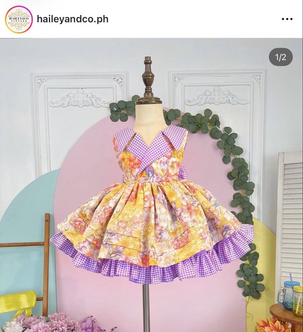 Hailey & Co S5 (Category: Babies & Kids Fashion) located in Manila. Submitted by annediwata (Listing ID 1466588246, Image 1). Description: Worn Once. First owner. Like New. Size 5 - Eye-catching yellow floral print with a purple and white checkered collar and layered hem - Full, playful puffed skirt silhouette with a cute back bow detail - Versatile statement piece perfect for dress-up days, parties, and family photoshoots.