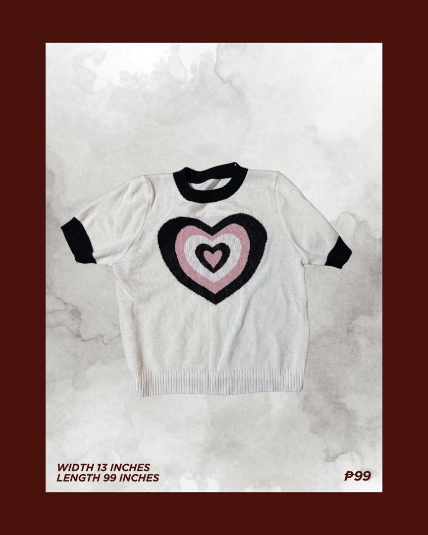 Heart Top (Category: Shirts) located in Manila. Submitted by marithe.kisses (Listing ID 1466716780, Image 1). Description: White short-sleeve knit top featuring a black and pink layered heart design with black trim on the collar and sleeves. .