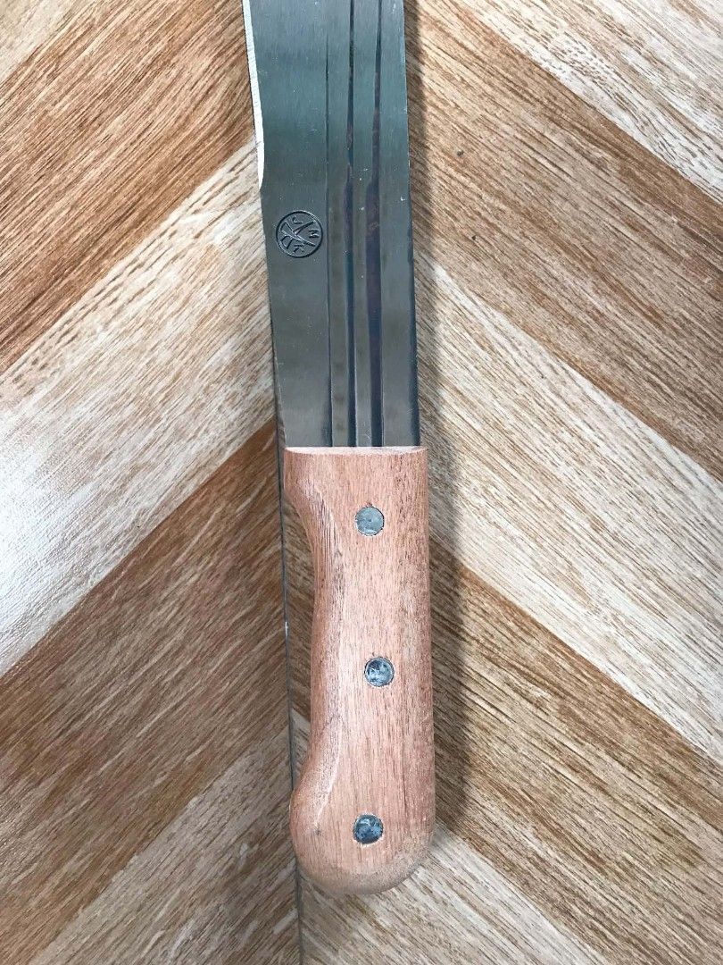 Heavy Duty Machete with Wooden Handle (Category: Knives & Chopping Boards) located in Quezon City. Submitted by davidmelvin28 (Listing ID 1466576770, Image 2). Description: - Sharp and sturdy machete - Ideal for clearing brush or gardening - Comfortable wooden handle for easy grip - Blade has minor scratches, but is in good, usable condition - Ready for its next task.