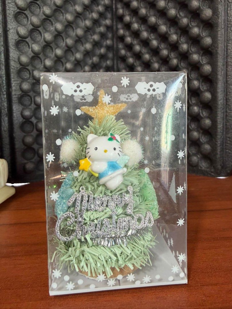 Hello Kitty Christmas Tree Decoration (Category: Character Goods) located in Manila. Submitted by janetecson05 (Listing ID 1466586375, Image 2). Description: - Set of 3 miniature Kitty Christmas ornaments - Includes distinct styles like a festive wreath and a decorated tree - Comes with clear individual plastic packaging boxes - 100% brand new and unused - Perfect cute decor for fans and holiday setups.