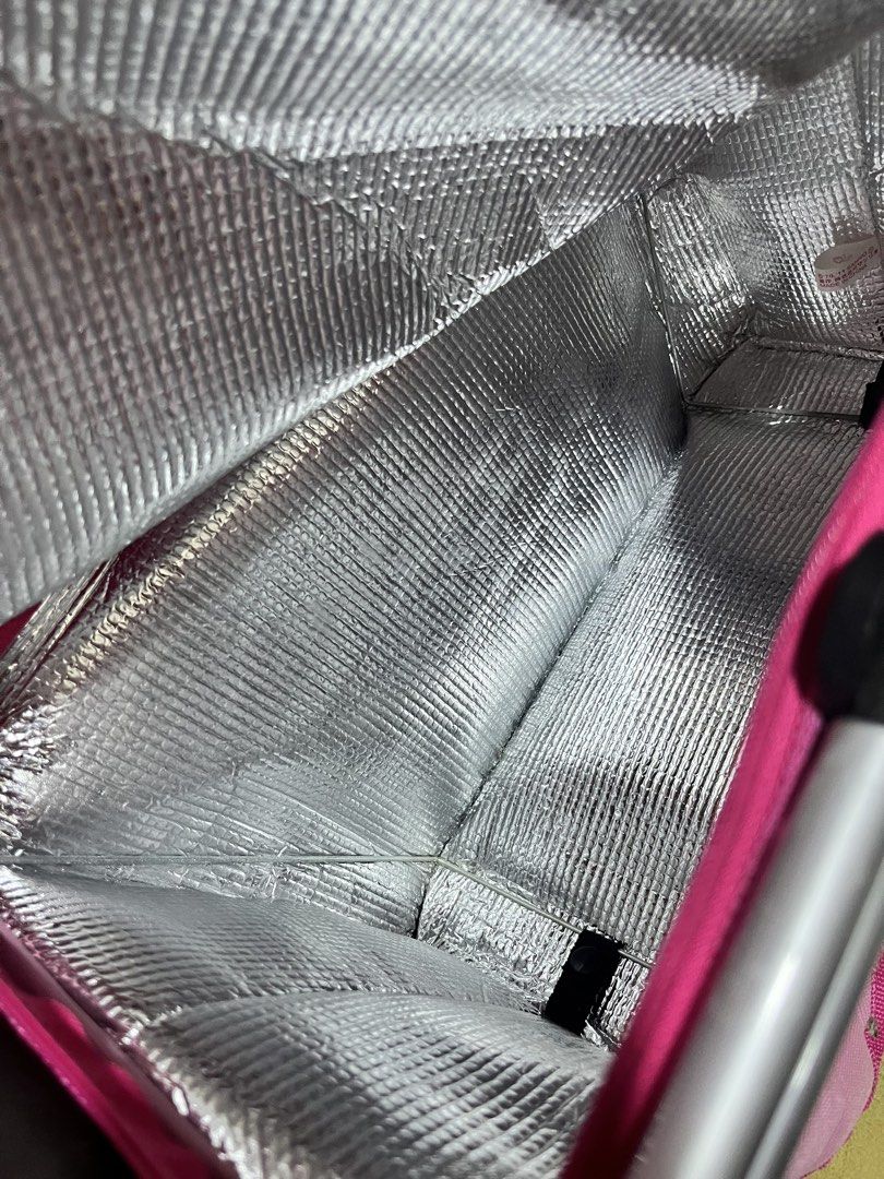 Hello Kitty Pink Picnic Basket Cooler Bag (Category: Shoulder Bags) located in Manila. Submitted by janetecson05 (Listing ID 1466649761, Image 3). Description: - Adorable pink Kitty design with playful cherry print - Sturdy aluminum frame with comfortable black grip handles - Built-in silver thermal insulation lining to keep food and drinks hot or cold - Versatile use for picnics, grocery shopping, or market runs - Conveniently folds flat when no