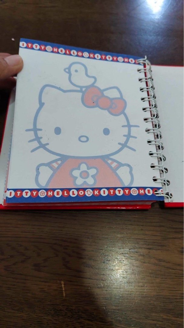 Hello Kitty Spiral Notebook Planner with Plush Cover (Category: Stationery & School Supplies) located in Manila. Submitted by janetecson05 (Listing ID 1466649074, Image 3). Description: - Official Sanrio-themed spiral notebook featuring a fluffy Kitty plush patch with her signature red bow - Week-at-a-glance layout (Monday to Sunday) with adorable character borders and space for daily notes - Durable red wire binding to keep your pages secure - G