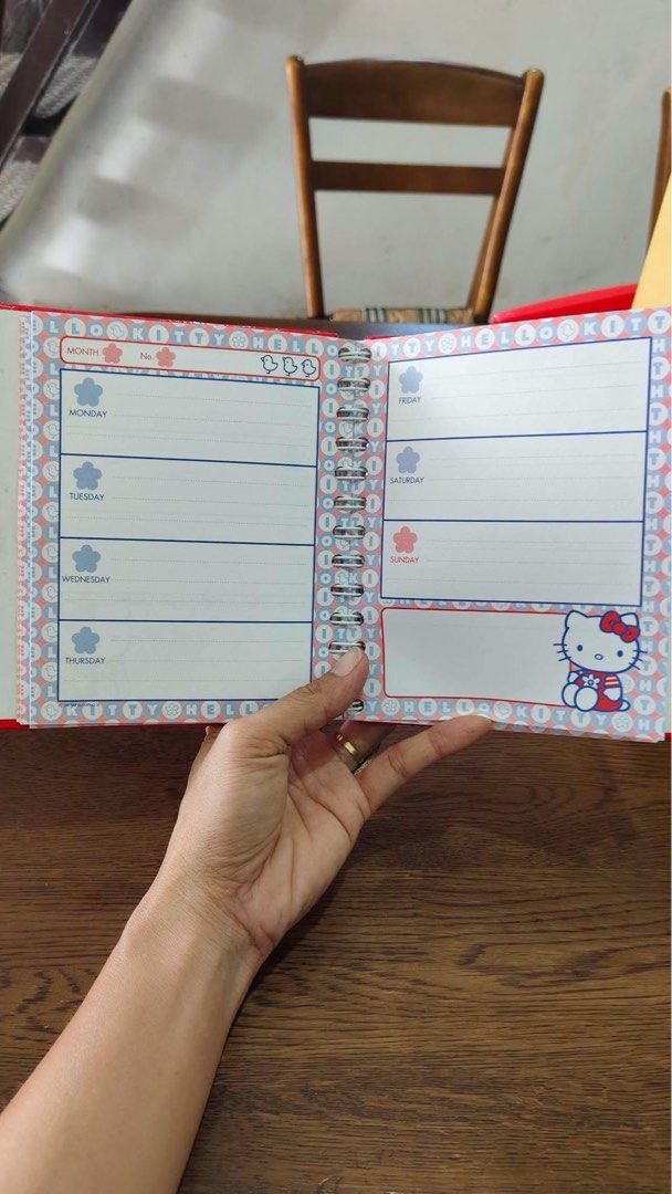 Hello Kitty Spiral Notebook Planner with Plush Cover (Category: Stationery & School Supplies) located in Manila. Submitted by janetecson05 (Listing ID 1466649074, Image 2). Description: - Official Sanrio-themed spiral notebook featuring a fluffy Kitty plush patch with her signature red bow - Week-at-a-glance layout (Monday to Sunday) with adorable character borders and space for daily notes - Durable red wire binding to keep your pages secure - G