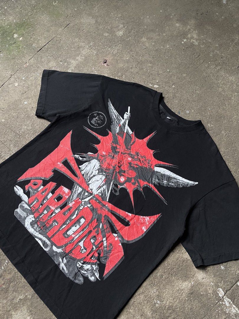 Hellstar Saint Michael Graphic Tee (Category: Tshirts & Polo Shirts ) located in Santiago. Submitted by ace.stuff (Listing ID 1466659972, Image 2). Description: No issues Like new Removed Necktag Beefy neckline Large fitting No cracks cool as hell graphic DM to purchase.