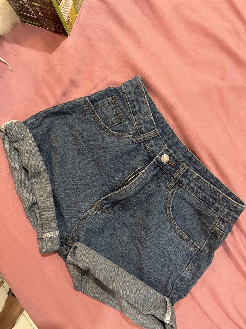 High waisted cuffed denim shorts medium wash (Category: Shorts) located in Manila. Submitted by mightystone-d948cd (Listing ID 1466772074, Image 1). Description: - Style: High waist denim shorts with cuffed hem - Wash: Medium wash - Closure: Front button and zipper with standard belt loops - Pockets: Functional front and back pockets - Material: Comfortable cotton denim - Fit: Easy to pair with basic tops or tanks for a casual everyday look.