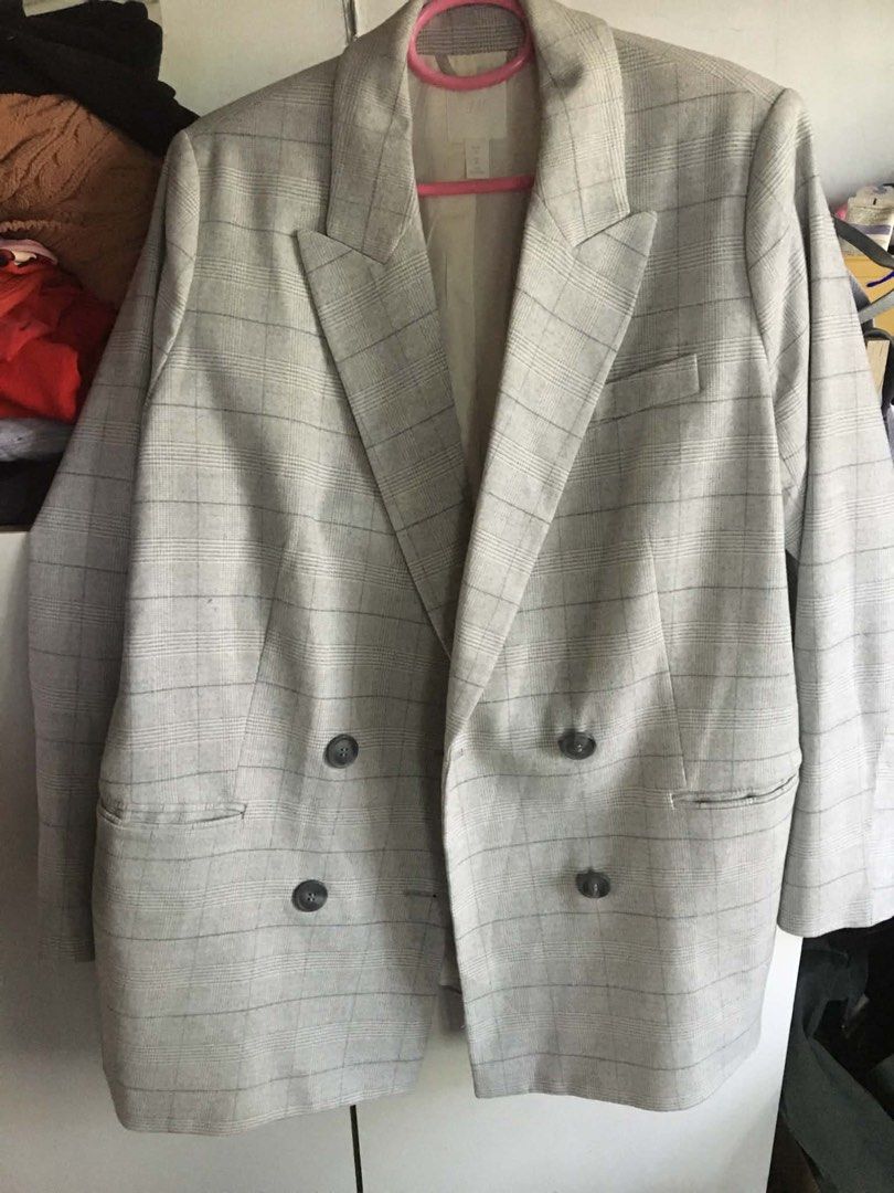 H&M Grey Plaid Double Breasted Blazer Size M (Category: Coats, Jackets and Outerwear) located in Manila. Submitted by rshay (Listing ID 1466724511, Image 1). Description: H&M double breasted blazer in grey with a plaid pattern. Size M, EUR M, CN 165/96A. Dark buttons down the front and pockets on each side. Fully lined interior. Oversized can fit up to XL.
