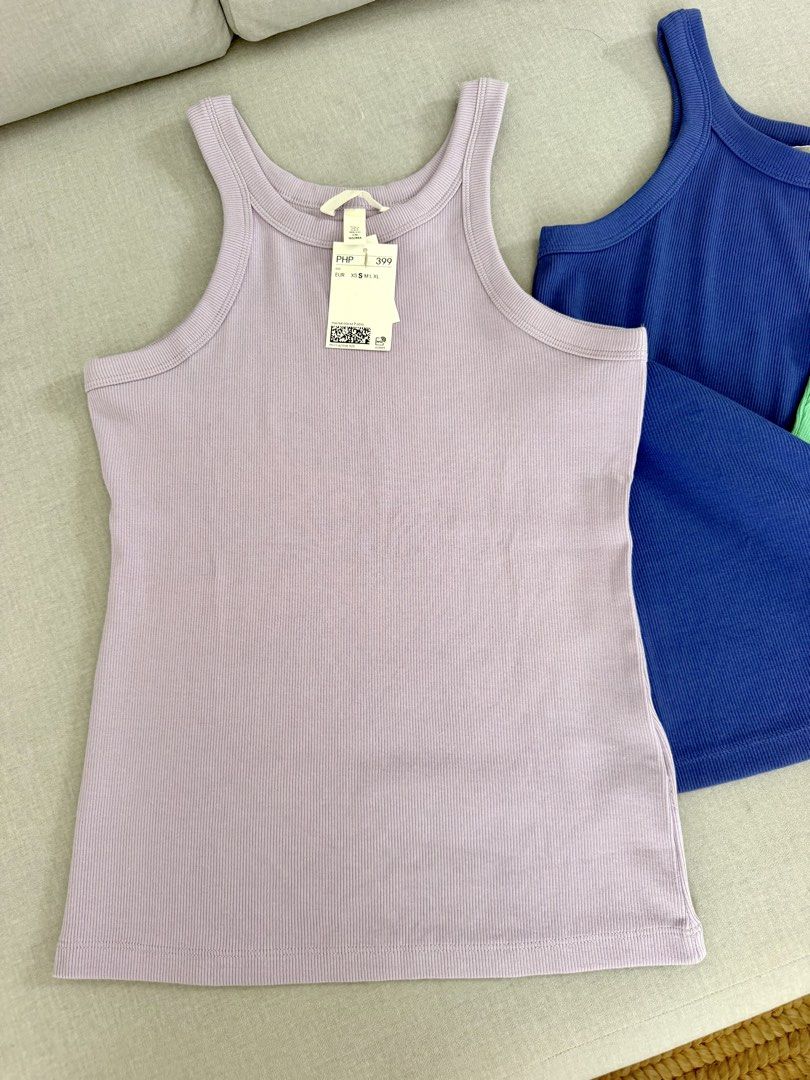 H&M Ribbed Tank Top Size S and M (Category: Sleeveless) located in Lipa City. Submitted by pauline0303 (Listing ID 1466574871, Image 2). Description: - Brand: H&M - Item: Bundle of 5 Ribbed tank tops - Color: royal blue, lavender, green, black - Size: S and M (Regular fit) - Material: Comfortable stretchy cotton - Design: Round neckline, sleeveless - Condition: 1 Brand new with tags (BNWT) and others Like New.