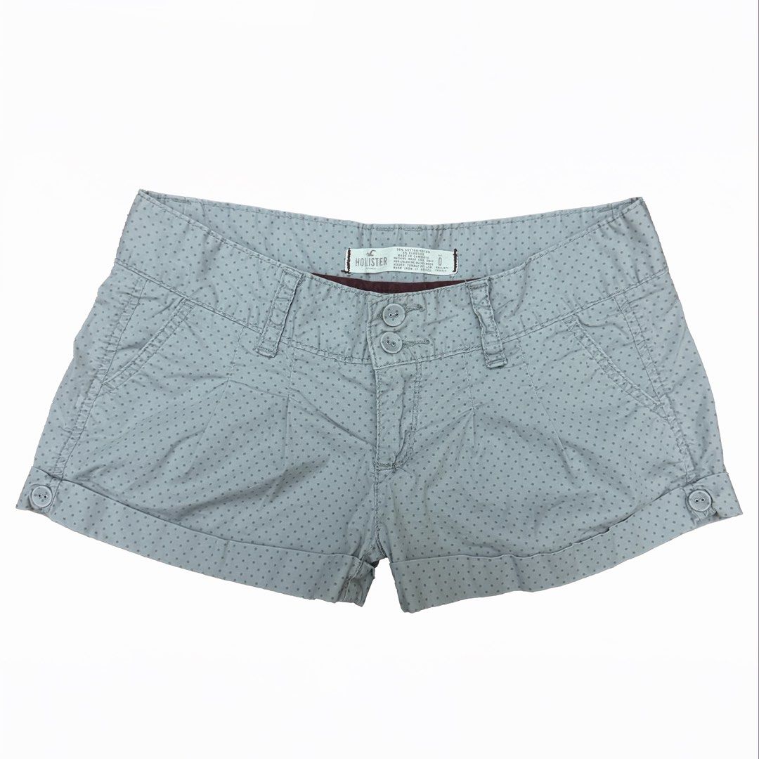 Hollister Polka Dot Cuffed Microshorts (Category: Shorts) located in Quezon City. Submitted by aivann (Listing ID 1466673783, Image 1). Description: - Brand: Hollister - Size: 0 (tag inside waistband) - Composition: 96% cotton, 4% elastane - Details: Double button front closure, folded cuffs, and decorative side buttons.