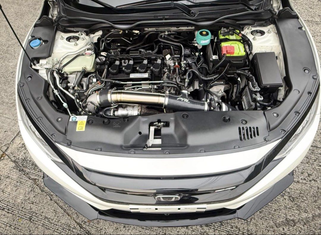 Honda Civic 1.5 Hatchback VTEC Turbo (A) (Category: Used Cars) located in Manila. Submitted by marco101801 (Listing ID 1466697866, Image 3). Description: 2018 Acquired Honda Civic RS Turbo Orchid White Pearl 56k mileage 1.5L Turbo PRL Intercooler Upgrade PRL Intercooler Charge Pipe Upgrade Kit PRL Front Pipe PRL Downpipe PRL Titanium Turbocharger Inlet Pipe PRL Motorsports 4.00” Inlet Oiled Cone Filter - Short PRL Turbo Inlet Pipe Conversion Hose