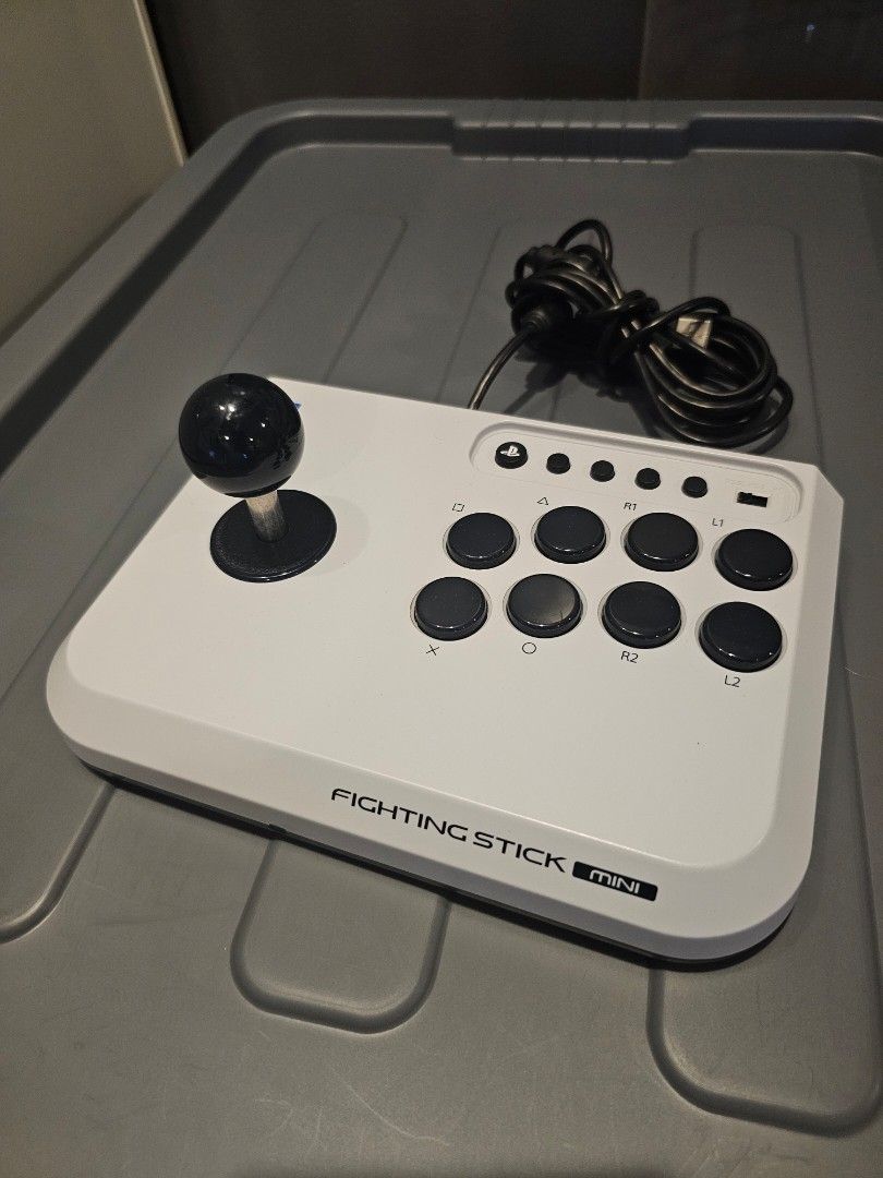Hori Fighting Stick Mini for PS5, PS4, and PC (Category: Controllers) located in Paranaque City. Submitted by thenextnumber7 (Listing ID 1466687754, Image 1). Description: - Platform Compatibility: Works seamlessly with PlayStation 5, PlayStation 4, and PC - Compact Design: Space-saving layout ideal for gamers with limited desk space - Arcade Feel: Features a standard arcade joystick and responsive action buttons - Easy Switching: Convenient mode