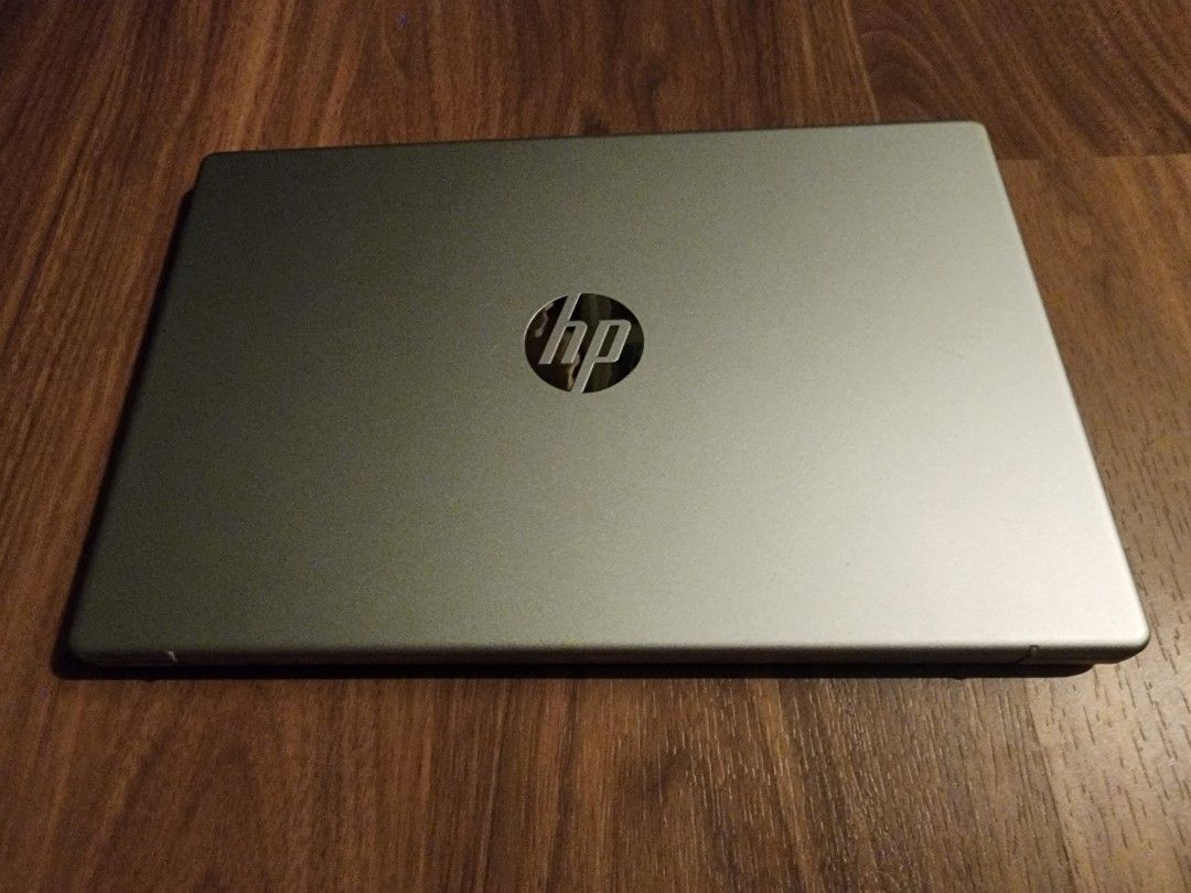 Hp laptop. (Category: Laptops & Notebooks) located in Manila. Submitted by abdulfatak37758 (Listing ID 1466728034, Image 1). Description: - Model: Silver HP Laptop - Processor: Intel Core i5 - Graphics: Intel Iris Xe Graphics - Condition: Powers on normally, with normal signs of use on the chassis - Features: Full keyboard layout, standard trackpad, and a clean metallic finish with a glossy HP logo - Best for: Daily work, studying, and casual bro