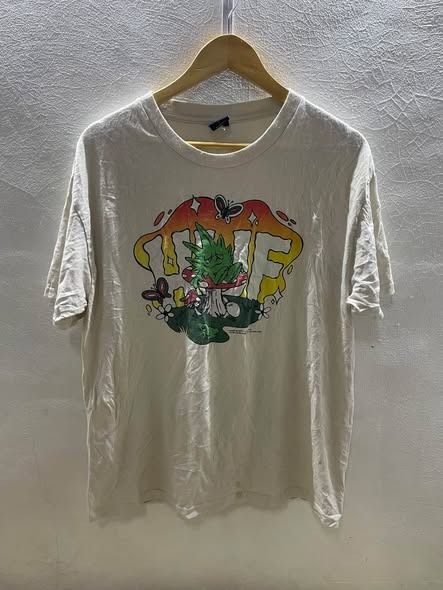 HUF X GREEBUDDY (Category: Tshirts & Polo Shirts ) located in Caloocan City. Submitted by j3ngsanity (Listing ID 1466708332, Image 1). Description: ISSUE : MIN CRACK PRINTS / NEED WASH MIN YELLOW STAIN DIMES : 21x27 LARGE BEST FIT.