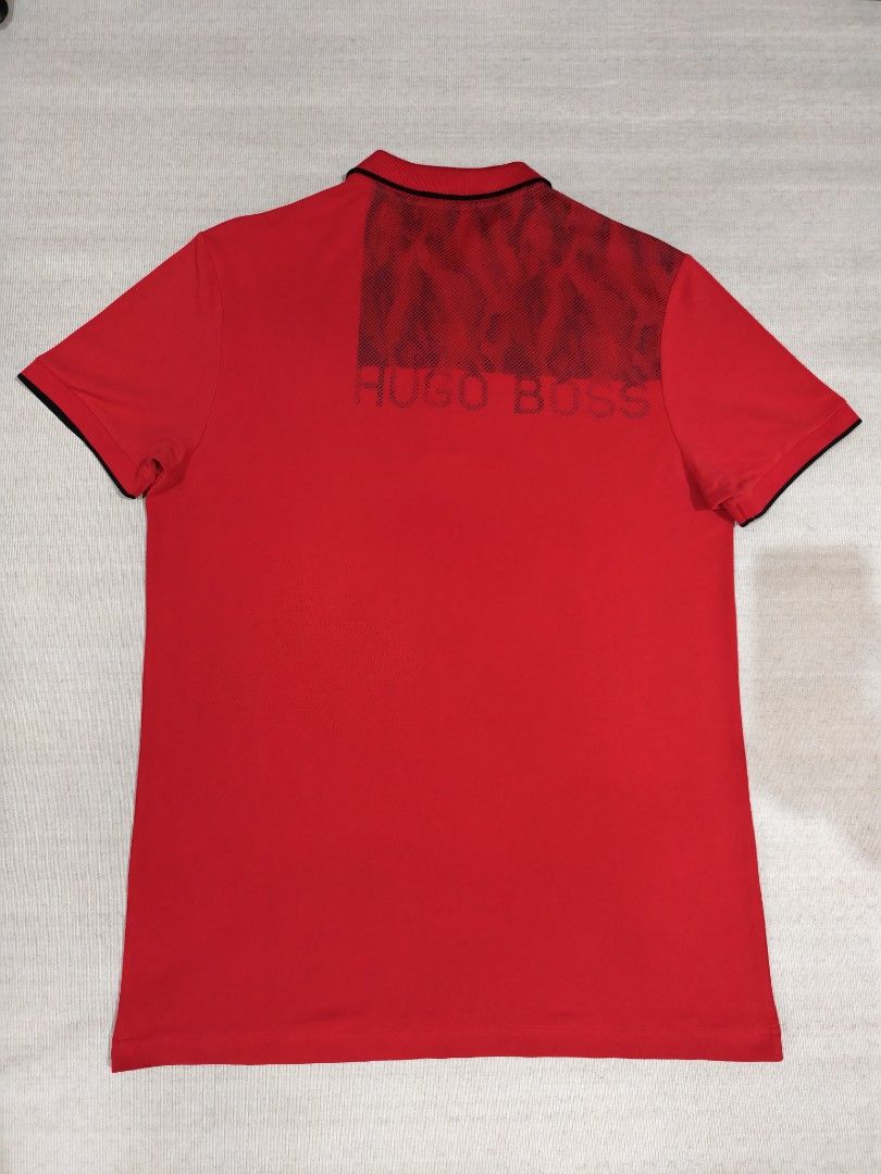 HUGO BOSS RED BIG LOGO (Category: Tshirts & Polo Shirts ) located in Baliuag. Submitted by vk_thrift01 (Listing ID 1466735673, Image 3). Description: HUGO BOSS RED BIG LOGO DIMES: 21X30.5 CONDI: EXCELLENT CONDITION COLOR RATE: 9.8/10 ISSUE: CUT WASHTAG, RUNS AND 1 SUPER SMALL PINHOLE ON BACK (ALL UNNOTICEABLE IN PERSON) NOTE: ‼️‼️‼️ 📌ALL ITEMS ARE THRIFTED NOT BRANDNEW SO KINDLY MANAGE YOUR EXPECTATIONS. 📌ALL ITEMS ARE NEEDS WASH 📌COLOR MAY SL