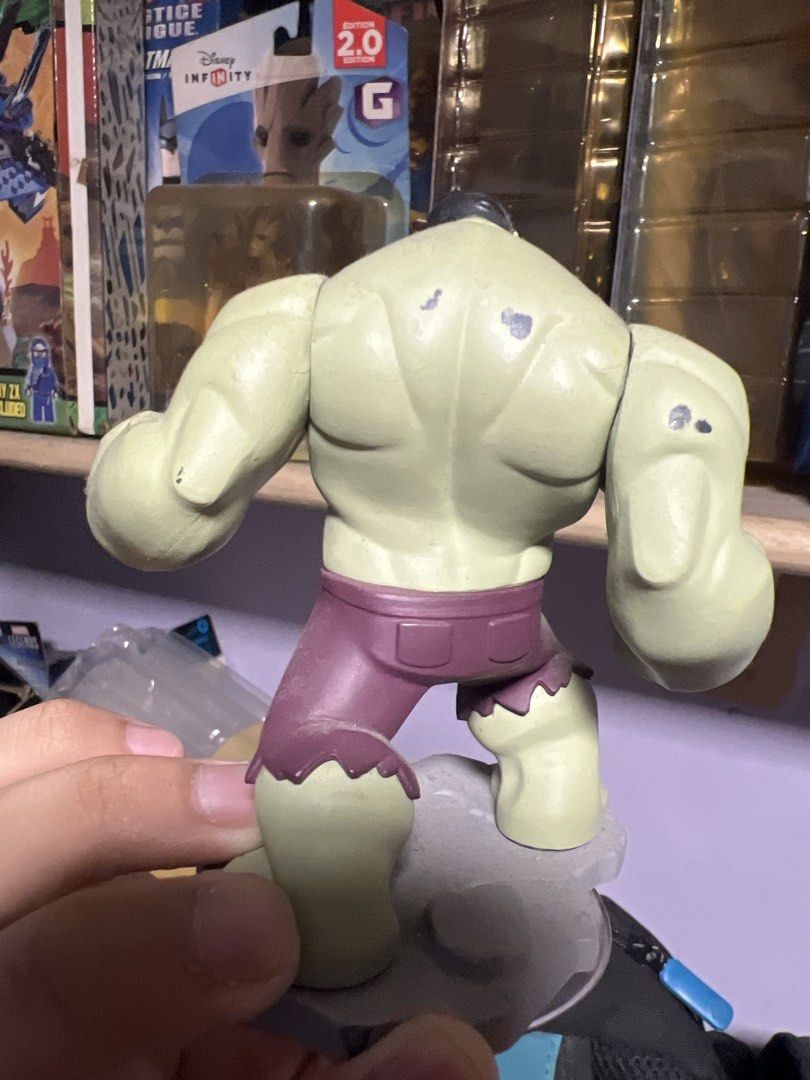 Hulk — Disney Infinity 2.0 Marvel Super Heroes Figure (Category: Figurines & Statues) located in Quezon City. Submitted by thegroovearchive (Listing ID 1466676403, Image 2). Description: - Authentic Disney Infinity 2.0 Hulk figurine - Iconic look with purple pants and grey rock base - Stands firmly and securely on its base - Condition: Green skin finish with minor paint scuffs/marks on the back shoulders and upper arm area - Perfect display piece
