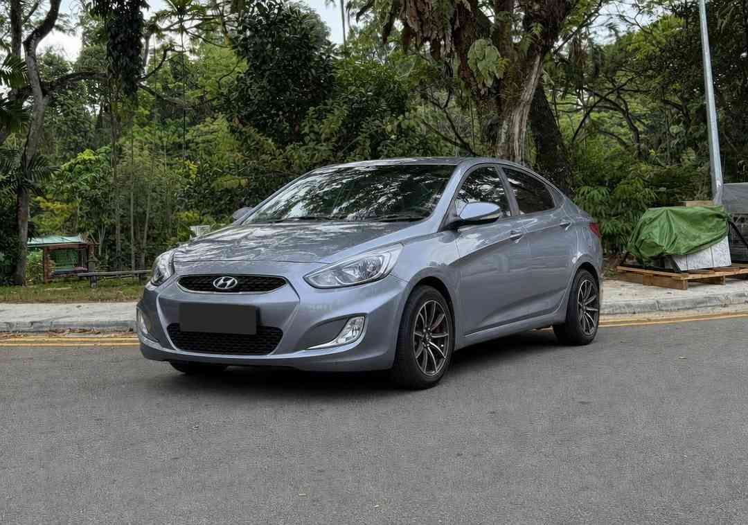 Hyundai Accent 1.4 CVT (A) (Category: Used Cars) located in Singapore. Submitted by carousell_certified_partners (Listing ID 1466600347, Image 1). Description: Road tax till 29/Jul/2027. Well maintained unit in excellent condition. Enjoy extra peace of mind with a lifetime engine warranty. No repairs needed just drive and go! Smooth, fuel-efficient engine. All trade-ins welcome. Bank/ in house loan available. Contact us today to arrange a viewing