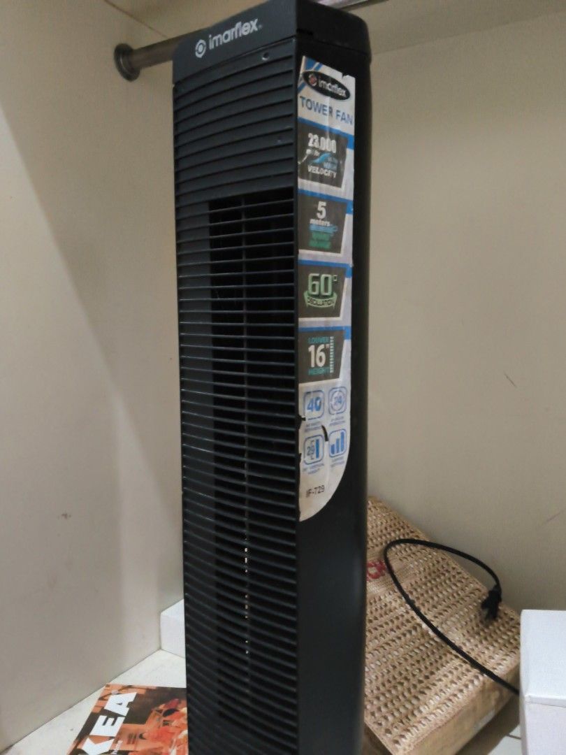Imarflex Tower Fan IF-729 (Category: Fans) located in Manila. Submitted by m3.law (Listing ID 1466631099, Image 1). Description: - Brand: Imarflex - Model: IF-729 - Color: Sleek Black - Type: Tall tower fan with slatted front vents - Features: 60-degree oscillation and adjustable louver height - Condition: Works great, perfect for cooling any room without taking up much space - Power: Standard plug-in cord included RFS relocate.
