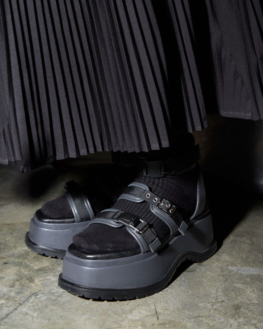 INITIAL Japan Black Platform Sandals Chunky Buckled Straps (Category: Flats & Sandals) located in Manila. Submitted by serendipitymanila (Listing ID 1466768397, Image 3). Description: - Color: Solid black - Design: Multiple adjustable straps with metal buckles - Sole: Heavy lug sole for extra height and grip - Styling: Wear bare or with socks - Versatility: Pairs great with skirts and jeans for a bold look.