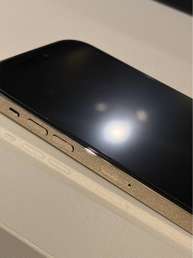 iPhone 14 Pro 256GB – Gold - Open Line (Category: iPhone 14 Series) located in Quezon City. Submitted by shopnomi (Listing ID 1466740969, Image 3). Description: iPhone 14 Pro 256GB * 256GB | Gold * Bought from Power Mac Center * 75% Battery Health * Factory Unlocked / Open Line (all networks) * No scratches, dents, or cosmetic flaws * Fully functional, no issues aside from battery health * Tempered glass + phone case since day one Inclusions: * O
