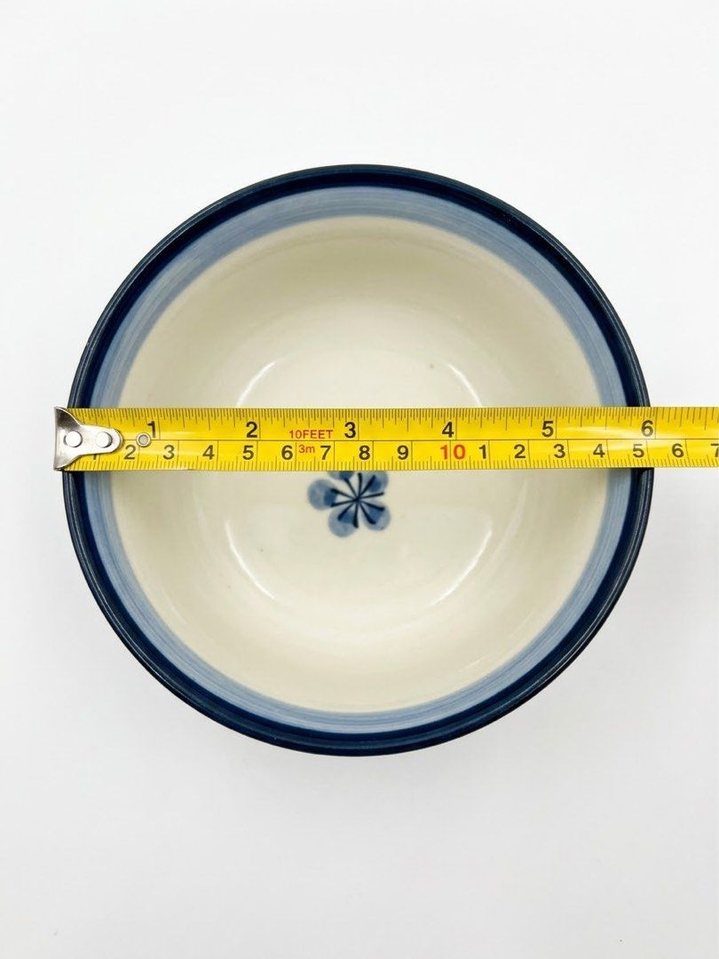 Japan blue glaze bowls (Category: Dinnerware & Cutlery) located in Manila. Submitted by rlab_japan_thrift (Listing ID 1466686390, Image 3). Description: Japanese Vintage Blue Glaze Ceramic Tea / Rice Bowls 2 sets💙🌸 ₱500 2 sets Beautiful set of authentic Japanese ceramic bowls featuring a vibrant medium-blue textured outer body, a hand-painted blue floral motif (plum blossom / sakura) inside the center, and a smooth gradient rim. Perfect size fo