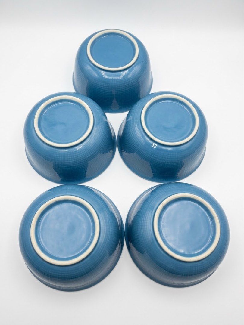Japan blue glaze bowls (Category: Dinnerware & Cutlery) located in Manila. Submitted by rlab_japan_thrift (Listing ID 1466686390, Image 2). Description: Japanese Vintage Blue Glaze Ceramic Tea / Rice Bowls 2 sets💙🌸 ₱500 2 sets Beautiful set of authentic Japanese ceramic bowls featuring a vibrant medium-blue textured outer body, a hand-painted blue floral motif (plum blossom / sakura) inside the center, and a smooth gradient rim. Perfect size fo