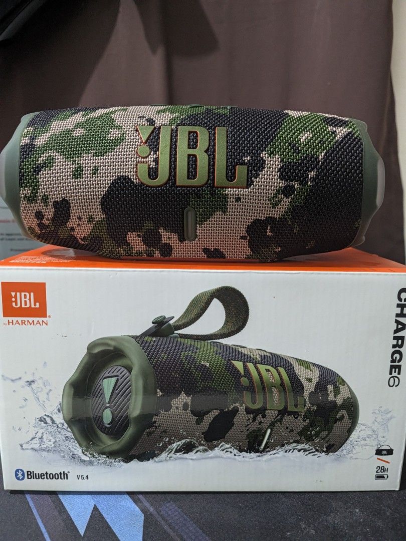 JBL Charge 6 Squad (Category: Soundbars, Speakers & Amplifiers) located in Makati City. Submitted by jb14corpuz (Listing ID 1466721491, Image 1). Description: - Model: JBL Charge 6 Wireless Speaker - Color: Stylish Camo Green pattern - Connectivity: Latest Bluetooth V5.4 support - Battery Life: Up to 28 hours of continuous playtime - Portability: Includes a handy carrying strap attached to the top - Packaging: Original box included with inside pa