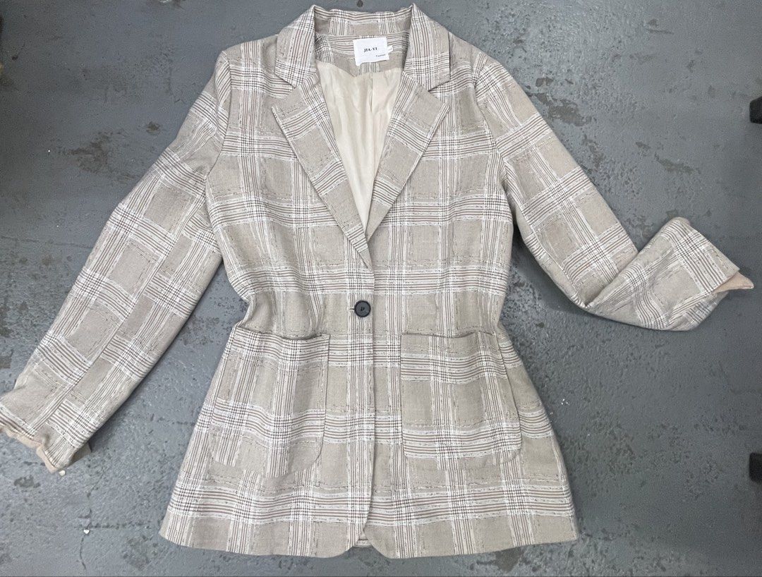 JIA-YI Beige Plaid Blazer Jacket Size L (Category: Coats, Jackets and Outerwear) located in Bulacan. Submitted by grazcloset (Listing ID 1466589814, Image 1). Description: NOTE : NO WHEN WORN - Brand/Model: JIA-YI beige plaid blazer - Size: L - Design: Lapel collar, single button front closure, structured waist, and two large patch pockets - Lining: Fully lined with cream fabric - Style: Versatile neutral piece, ideal for work outfits or casual l