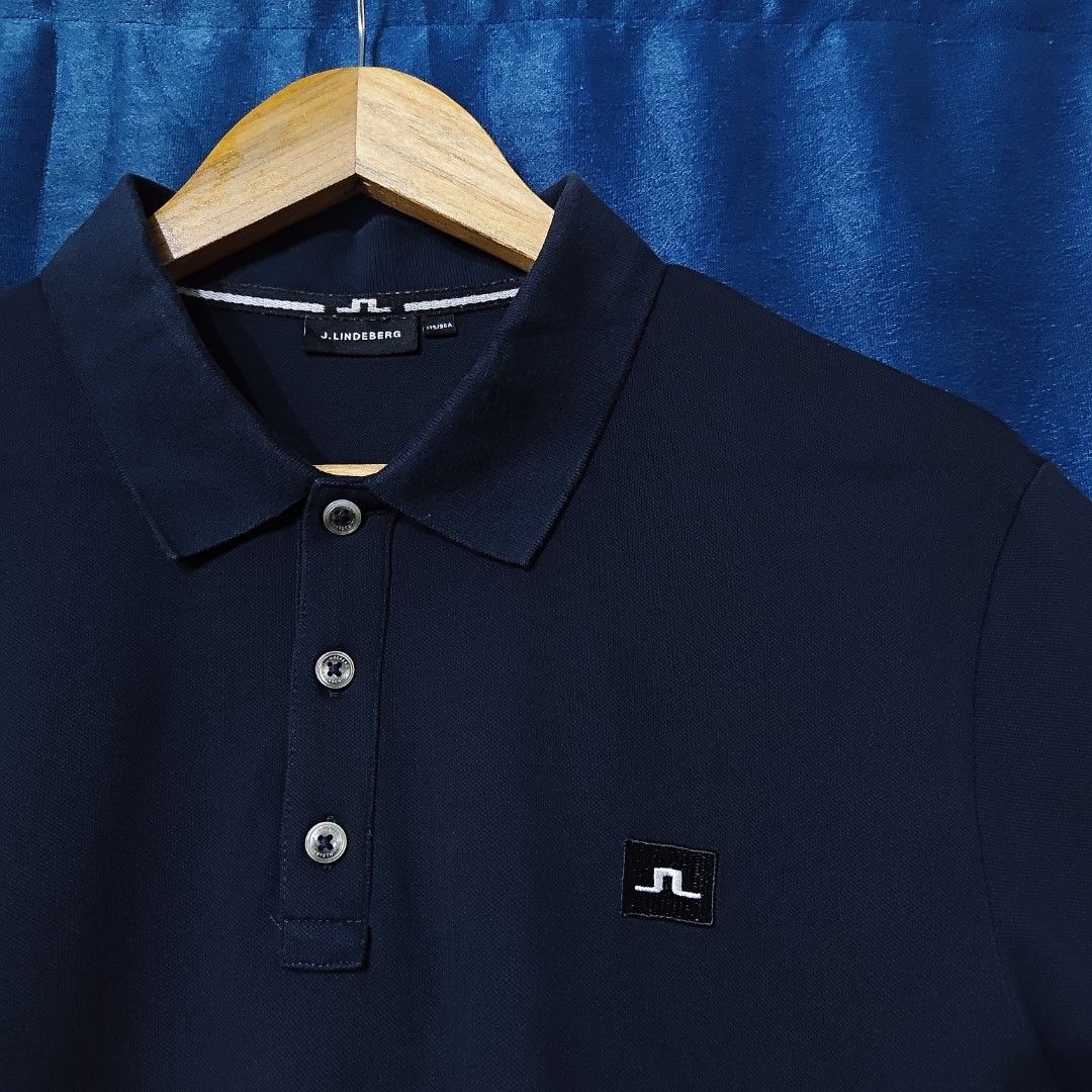 j.lindeberg BASIC LOGO POLO SHIRT (Category: Tshirts & Polo Shirts ) located in Makati City. Submitted by upcycled.closeth (Listing ID 1466619080, Image 3). Description: - Authentic J.lindeberg product - Navy blue / short sleeve - Size: medium (men's) - Like new - Authentic - flaws: no flaws - Excellent condition - Need wash, fresh from bale - Features design of J.lindeberg embroidery logo - Material: 100% cotton !!STILL NEGOTIABLE!!.