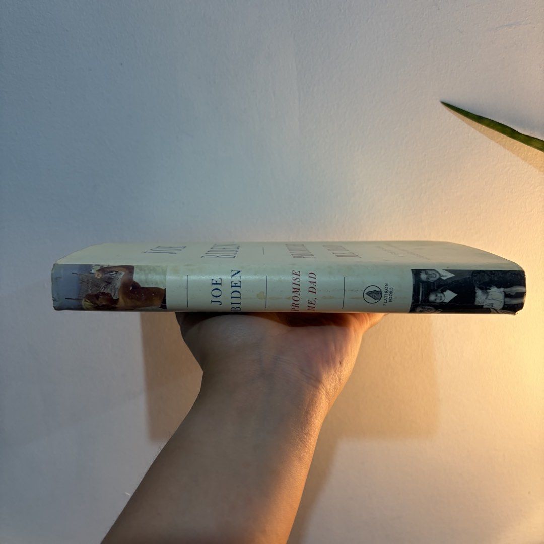 Joe Biden Promise Me Dad (Category: Storybooks) located in Manila. Submitted by ajdeclutter (Listing ID 1466580401, Image 2). Description: - Title: Promise Me Dad: A Year of Hope, Hardship, and Purpose by Joe Biden - Format: Hardcover with original dust jacket - Publisher: Flatiron Books - Condition: Good, with some shelf wear along the edges and minor dirt marks on the cover .