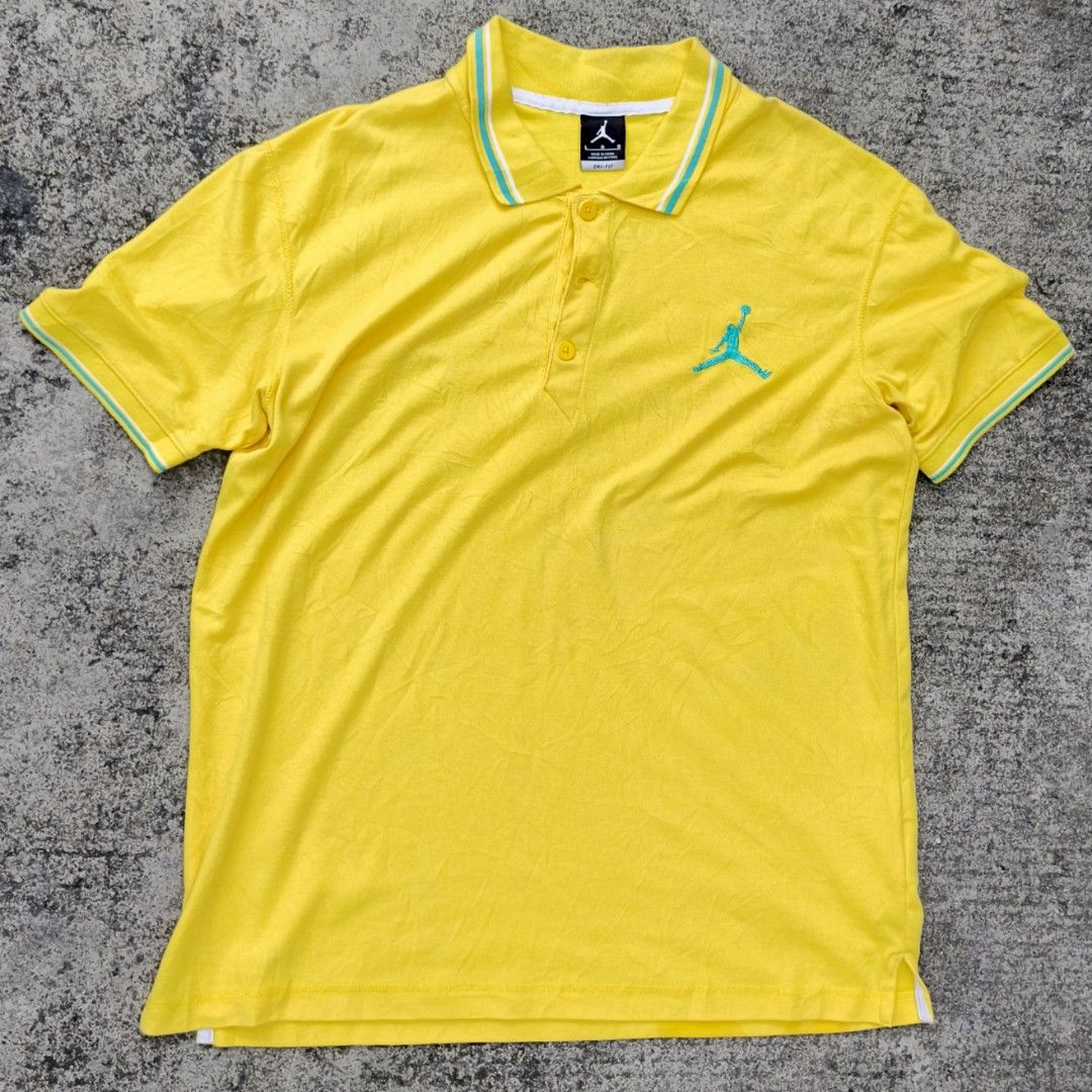 Jordan (Category: Tshirts & Polo Shirts ) located in Bacolod City. Submitted by loothingsph (Listing ID 1466693993, Image 1). Description: - Brand: Jordan - Color: Bright yellow with light blue and white striped tipping - Details: Embroidered Jumpman logo on chest, 3-button placket - Fit: Standard fit - Condition: Clean, vibrant colorway - issue stains and one button broke shipping via J&T.