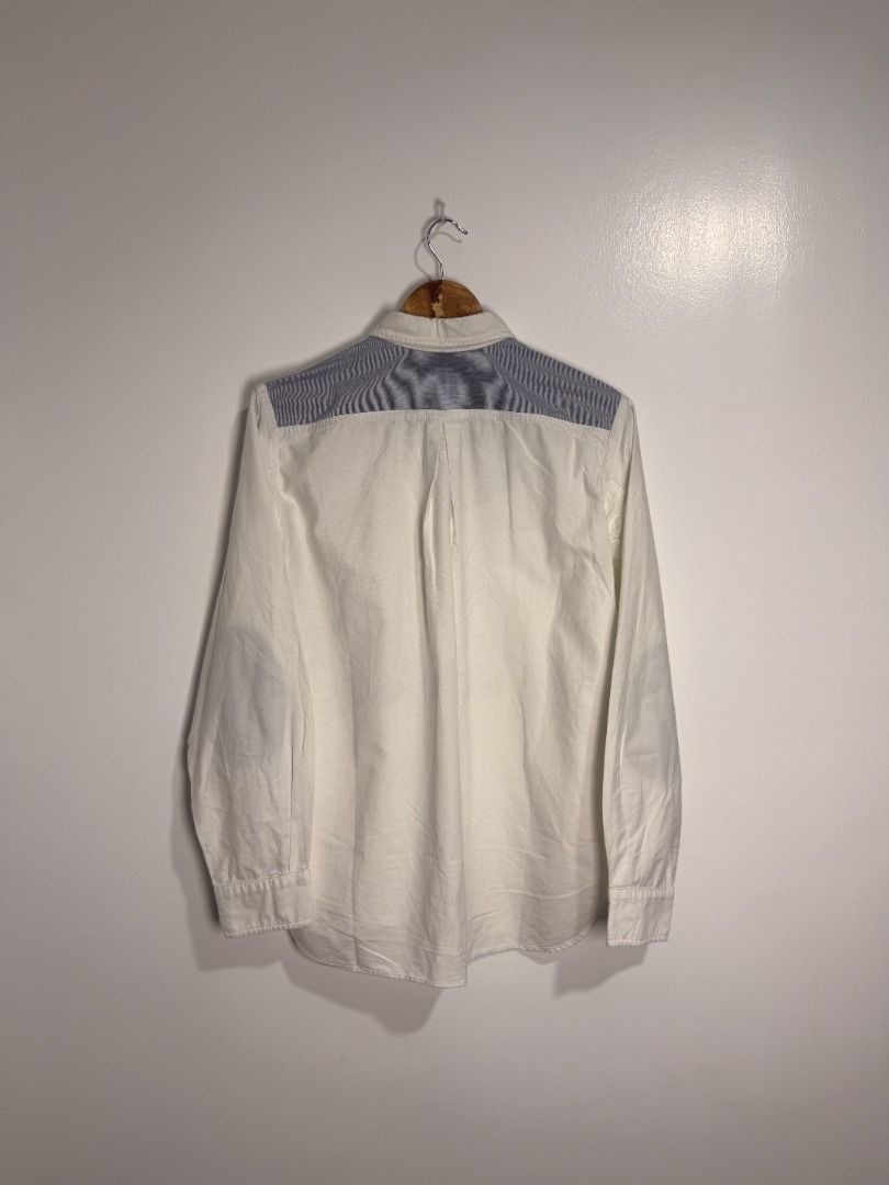 Junya Watanabe Oxford Button Up Shirt (Category: Formal Shirts) located in Binan City. Submitted by caughtfire (Listing ID 1466764805, Image 3). Description: Flaws : Dust stains. Color rate 7/10. Vintage Condition Chest 21.5 in/54.6 cm Length 28 in/71.1 cm Sleeve Length 25 in/63.5 cm.
