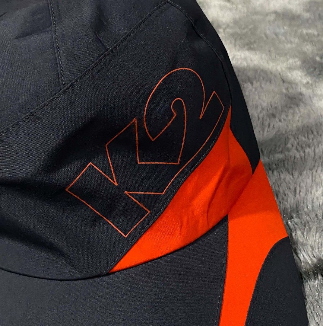 K2 Technical Outdoor GORE-TEX Cap Size L (Category: Caps & Hats) located in Sorsogon. Submitted by johnmichae69459 (Listing ID 1466703896, Image 3). Description: - Brand/Model: K2 Technical Outdoor Cap - Color: Black and orange - Material: 100% polyester shell and lining with Gore-Tex waterproof fabric - Size: L (60) - Features: Adjustable strap with buckle closure and K2 logo hardware - Condition: Clean and ready to wear - Best for: Hiking, camp