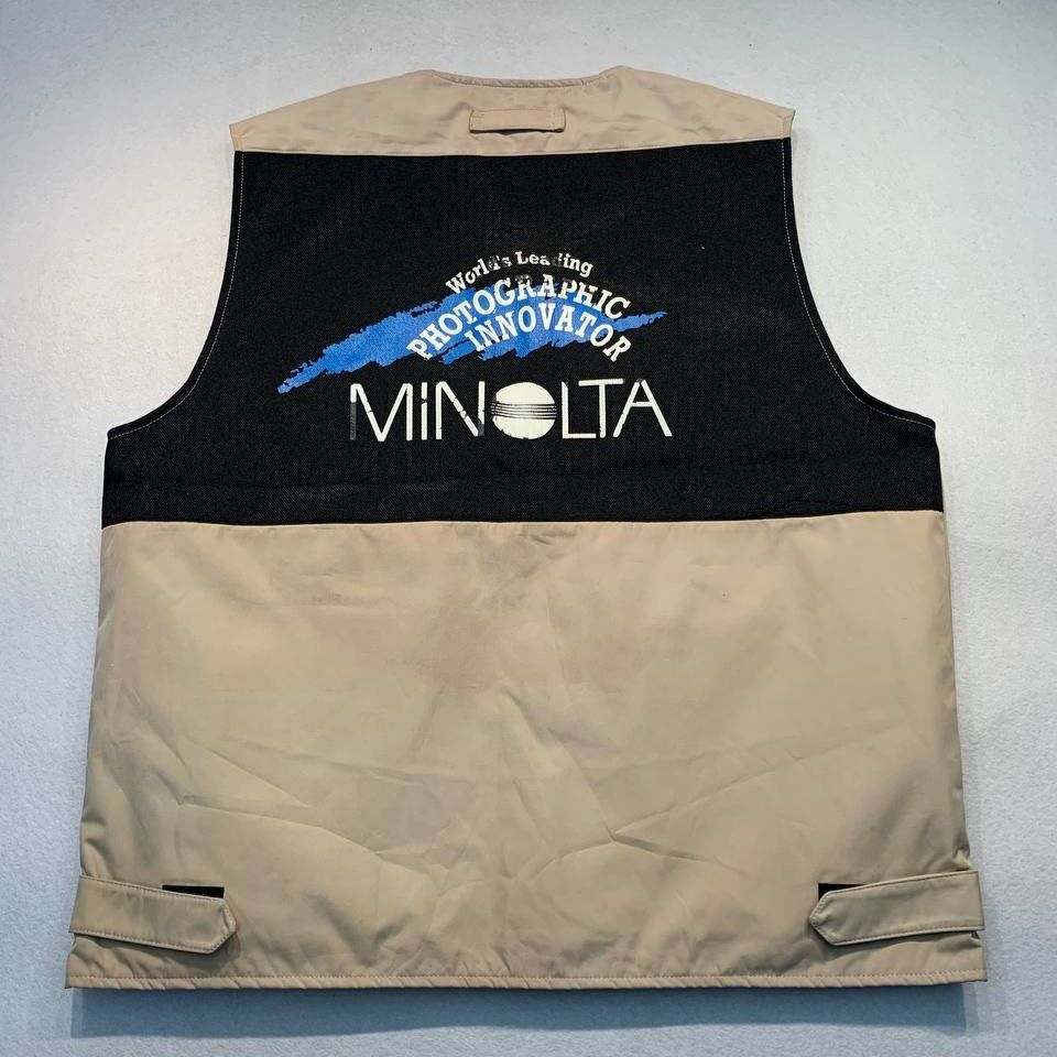 Kappa x Minolta Beige Utility Cargo Vest (Category: Vests) located in Mandaluyong City. Submitted by theroom501 (Listing ID 1466687068, Image 2). Description: Kappa x Minolta Beige Utility Cargo Vest Style Code: Size on Tag: Large Color: Cream Condition: Good pre-owned condition with a heavily distressed vintage look. Flaws/Issues: Discoloration and Crack print dust stain need wash. Flat Lay Measurements: Pit to Pit: 23 inches Length: 25.5 inches