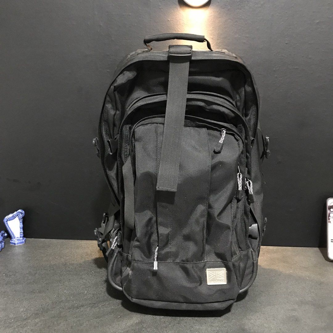 Karrimor Luggage Backpack (Category: Backpacks) located in Baao. Submitted by all.things.japan (Listing ID 1466714287, Image 1). Description: 21.0 x 10.0 x 13.0 inches - Brand: Karrimor - Color: Black - 2-in-1 Design: Easily converts from a travel backpack to a rolling trolley bag - Mobility: Features a sturdy pull-out handle and smooth-rolling wheels - Comfort: Padded shoulder straps that neatly tuck away when used as a trolley - Organization: M