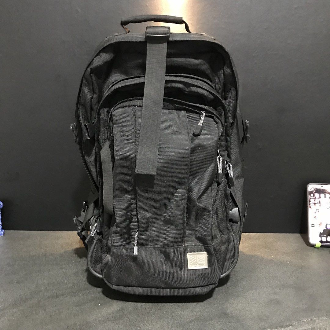 Karrimor Luggage Backpack (Category: Backpacks) located in Baao. Submitted by all.things.japan (Listing ID 1466714287, Image 2). Description: 21.0 x 10.0 x 13.0 inches - Brand: Karrimor - Color: Black - 2-in-1 Design: Easily converts from a travel backpack to a rolling trolley bag - Mobility: Features a sturdy pull-out handle and smooth-rolling wheels - Comfort: Padded shoulder straps that neatly tuck away when used as a trolley - Organization: M