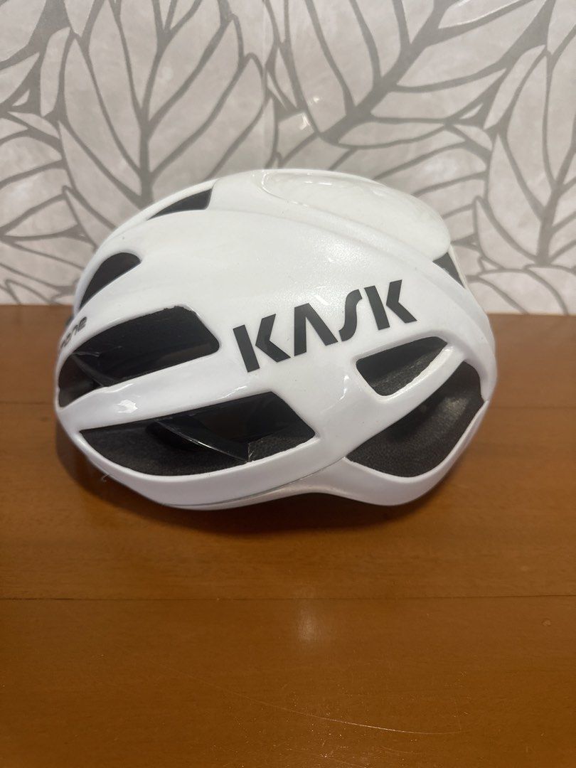 Kask Protone Cycling Helmet White (Category: Bicycles) located in Makati City. Submitted by twodoxies (Listing ID 1466609729, Image 2). Description: - Brand: Kask Protone - Color: White with classic branding - Type: Premium road bike helmet - Design: Aerodynamic with multiple ventilation ports - Comfort: Red and black interior padding for a secure fit - Closure: Adjustable straps with standard buckle - Condition: Clean outer shell, ready for your