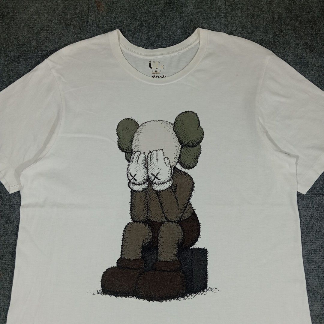 Kaws x Uniqlo Passing Through Tee (Category: Activewear) located in Taguig. Submitted by sito. (Listing ID 1466629169, Image 2). Description: For sale! 📣 Kaws x Uniqlo Passing Through Tee Specs and measurements: • Size XL • Length 31 inches • Width 23 inches Condition Details: • Issue: NONE • Color rate: 10/10 • Overall Condition: 10/10 Asking Price: ~₱520 Transaction Details: Location: Upper Bicutan, Taguig City, Metro Manila, 1633 Payment: Gca