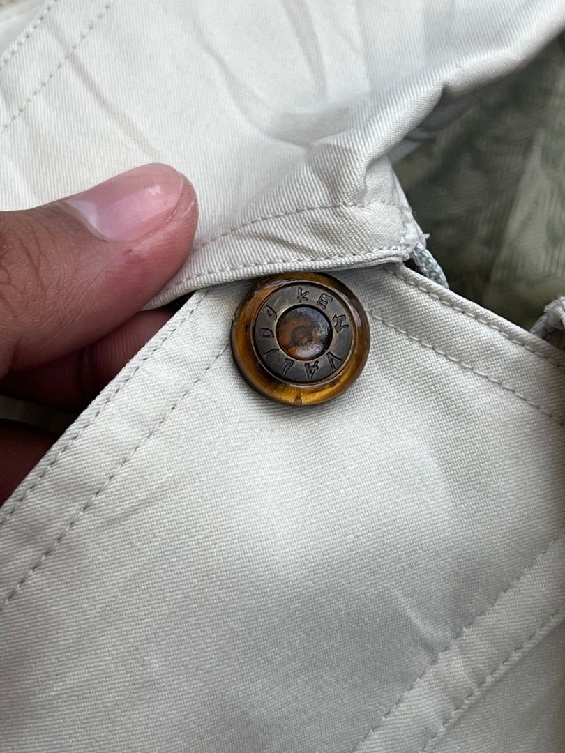 Ken Valido Vintage Cream Casual Jacket Size Large (Category: Coats, Jackets and Outerwear) located in Caloocan City. Submitted by sillapwet0606 (Listing ID 1466571824, Image 2). Description: - Brand: Ken Valido - Size: Large - Color: Cream with green patterned inner lining - Design: Detailed front panels with textured vertical stripes and shoulder trim - Closure & Cuffs: Branded horn-style buttons - Hem: Elastic ribbed waistband - Origin: Made in