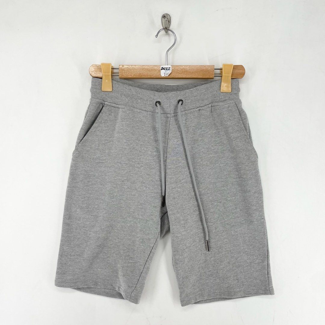 Kenzo Logo Back Leg Grey Sweat Shorts (Category: Shorts) located in Manila. Submitted by buzz.garments (Listing ID 1466627738, Image 3). Description: Size: Medium on tag Dimensions(inches) -Waist/Width: 28”-36” (Strechable) -Hip: 20” -Front Rise: 12” -Thigh: 10” -Inseam: 9” -Outseam/Length : 20” -Leg Opening: 8” - color may vary due to lighting. please manage your expectations-minimal and unseen flaws must be considered..
