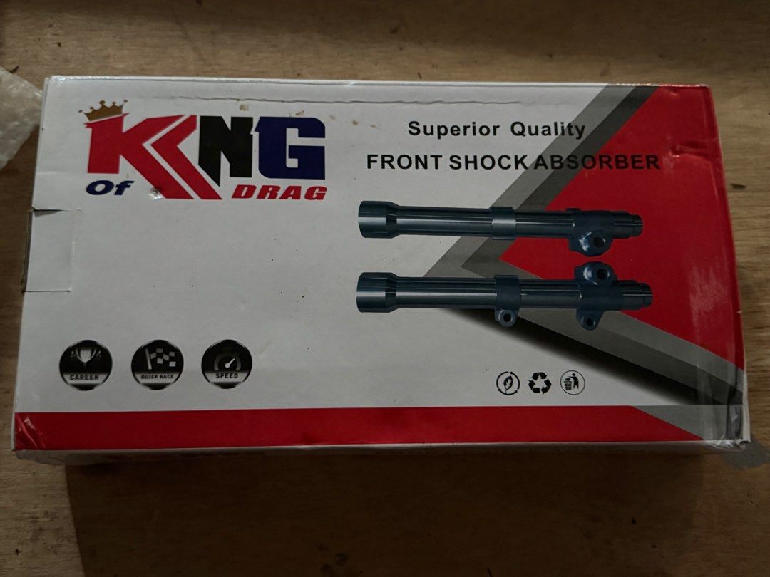 King Of Drag Front Shock Absorber (Category: Suspension Parts & Accessories) located in Quezon City. Submitted by swiftstone_f6c72e (Listing ID 1466570583, Image 1). Description: - Brand new King of Drag front shock absorber set - Stylish silver and black finish with detailed metal texturing - Includes complete set (both left and right side absorbers) - Comes in original box with custom cut foam protection for safe transport - Ready to install an