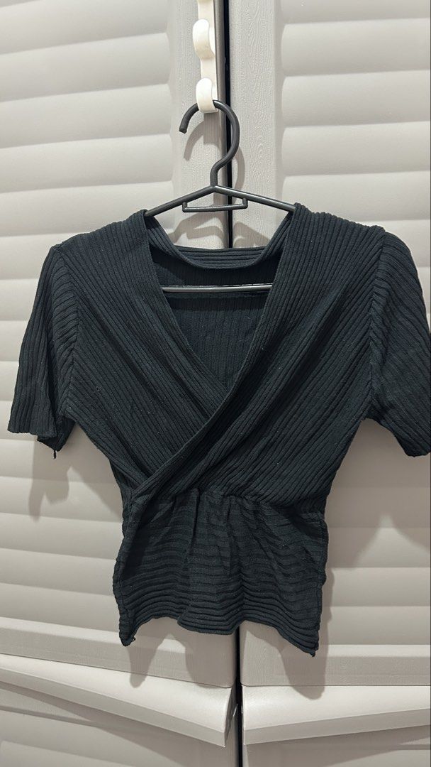 Knitted V-neck Top (Black) (Category: Blouses) located in Rizal. Submitted by veronica_lodge (Listing ID 1466634385, Image 2). Description: Selling for decluttering purposes 🤍 🏷️ TAKE ALL 11 TOPS FOR ONLY ₱1,100!!✨ Check out my account and grab all 11 tops from my listings for just ₱1,100! 🛍️💕 About this item: ✨ Like new — worn only once ✨ Very stretchable & comfortable ✨ Exactly as shown in the photos ✨ Fits XS–M girlies 📏 Recommended for a